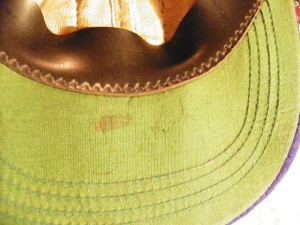 Look closely to make out the signature of Sandy Koufax on this 65-year-old cap.