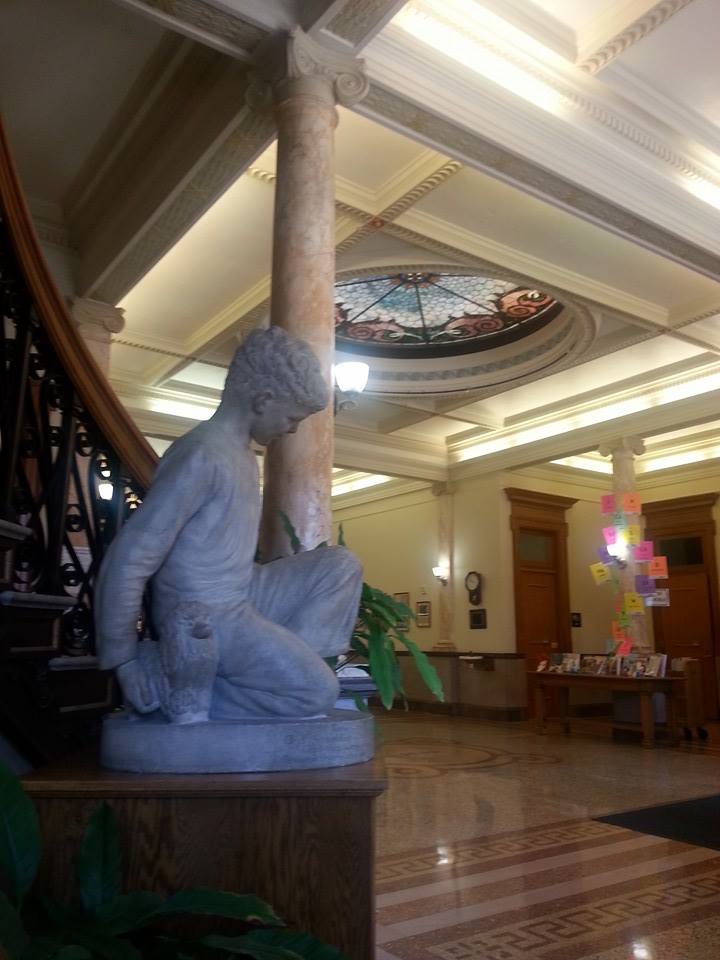 The statue representing Eugene Field's "Little Boy Blue" from the poem of the same name. It is located in the St. Joseph, Mo. downtown public library (Gretchen Lord Anderson photo).
